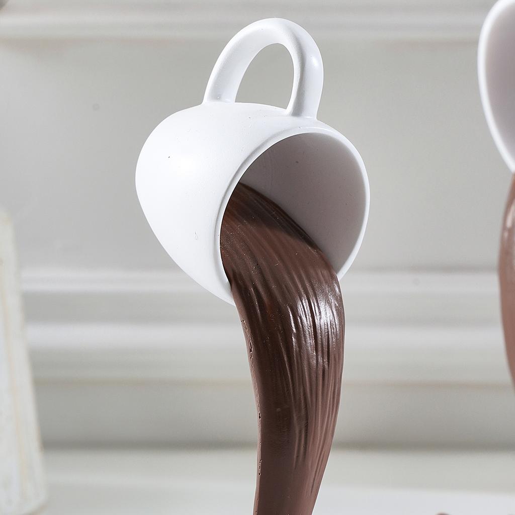 1 ud., un artículo decorativo de taza de café basculante antigravedad tridimensional suspendida hecho de resina.