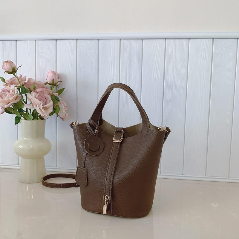 

Fashion casual portable small bag women s new simple and versatile bucket bag niche messenger bag кофейный