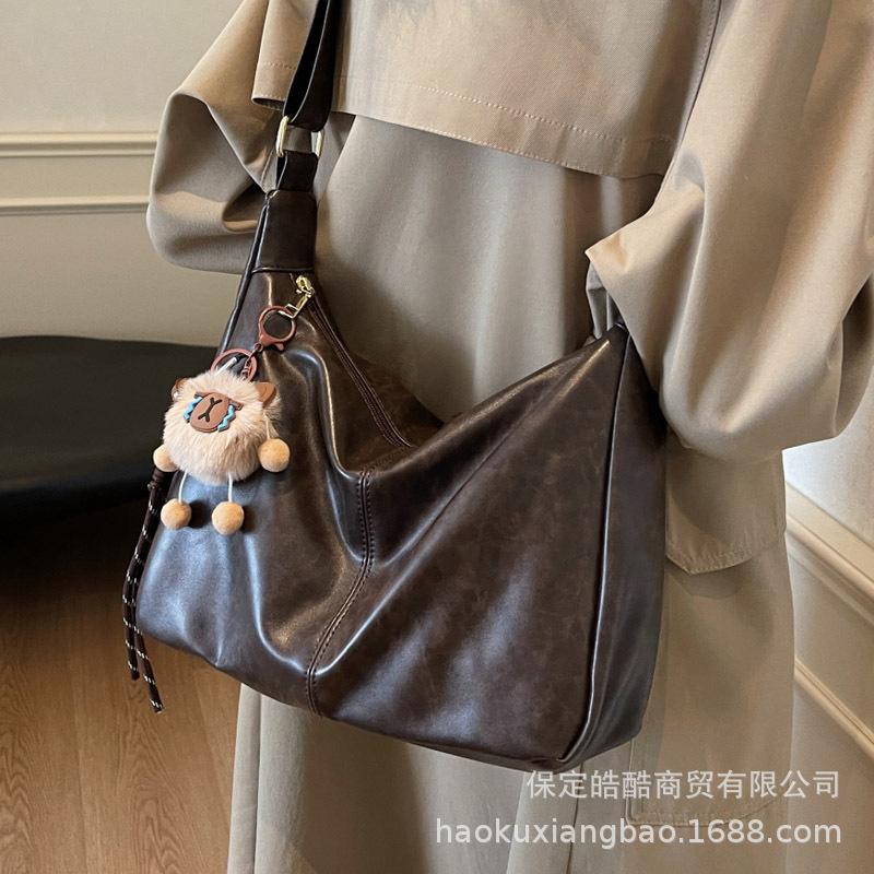 Tote bag women's large capacity 2025 new trendy versatile spring and summer soft leather shoulder messenger bag casual student class bag