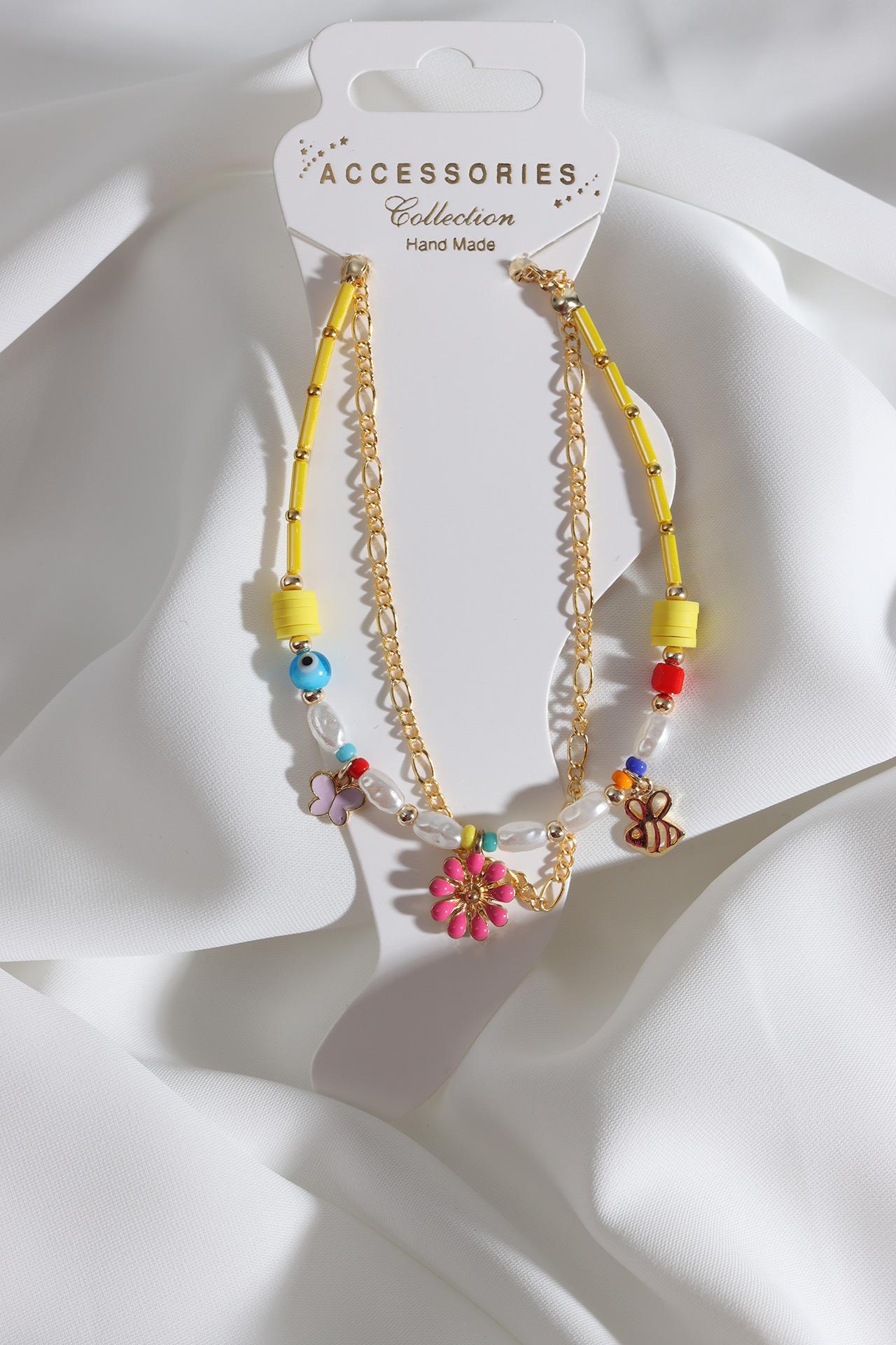 

Комплект из 2 браслетов с подвеской-цепочкой желтого цвета и бисером золотого цвета