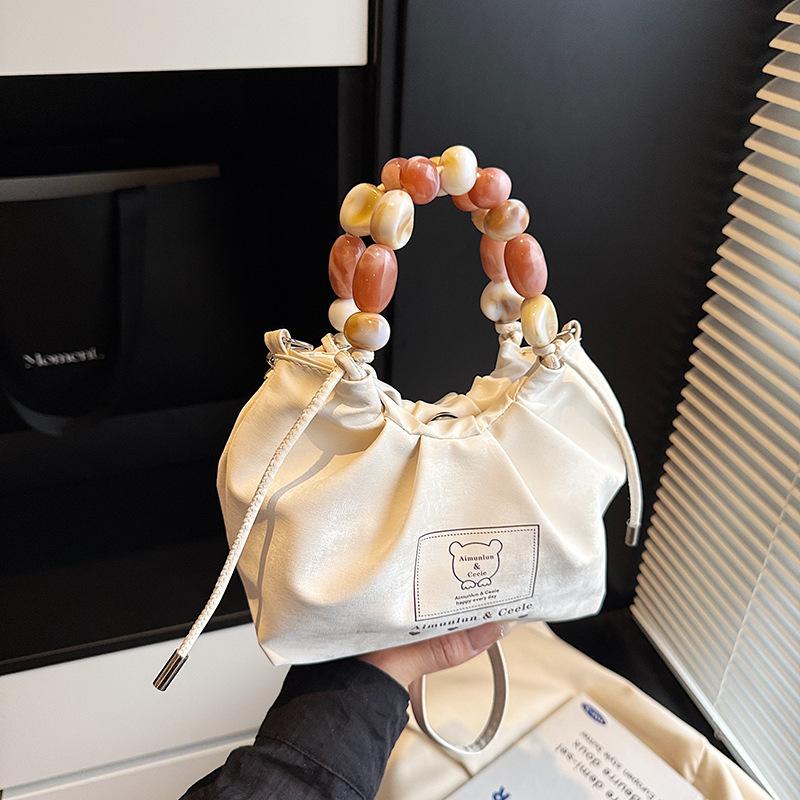 

Summer dumpling bag women s 2025 new trend versatile fashion beaded handbag casual foreign texture messenger bag белый
