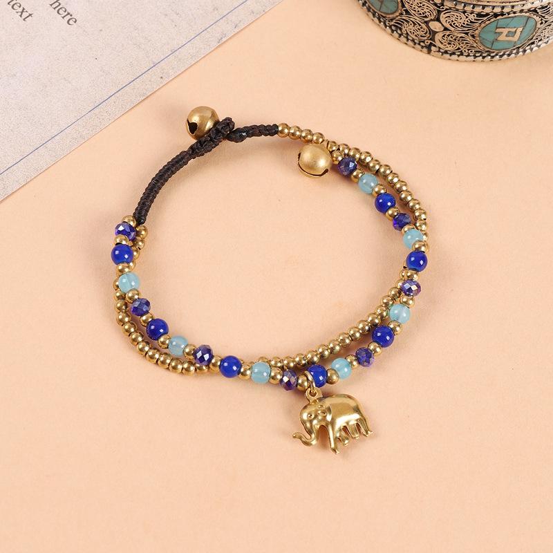 

Ethnic Hand-Woven Elephant Bracelet: Bohemian Tibetan Style with Vintage Double Beads and Bell Charm for Women