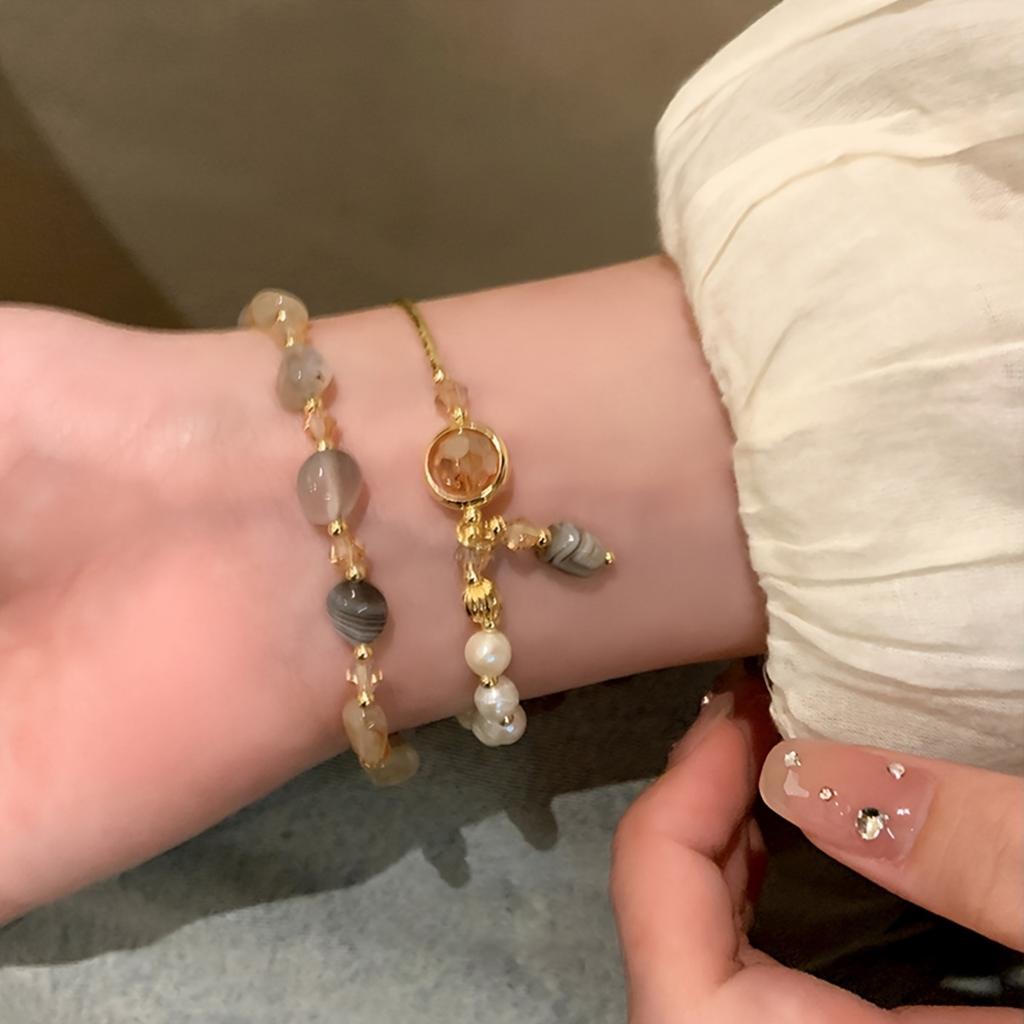 An Elegant Bohemian-Style Bracelet, Paired with a Synthetic December Birthstone for Women - a Trendy