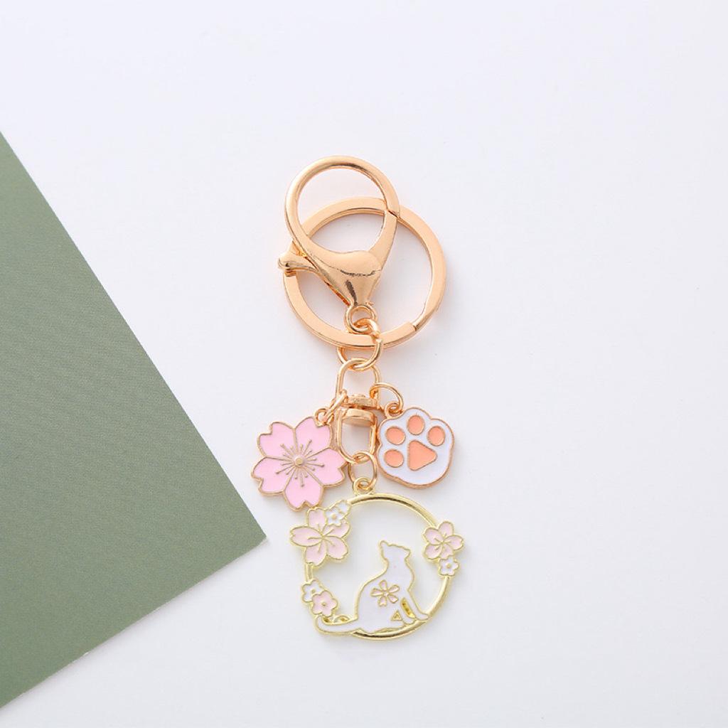 

Adorable Pink Flower Rabbit Keychain | Charming Cartoon Alloy Accessory for Girls Bags & Car Keys