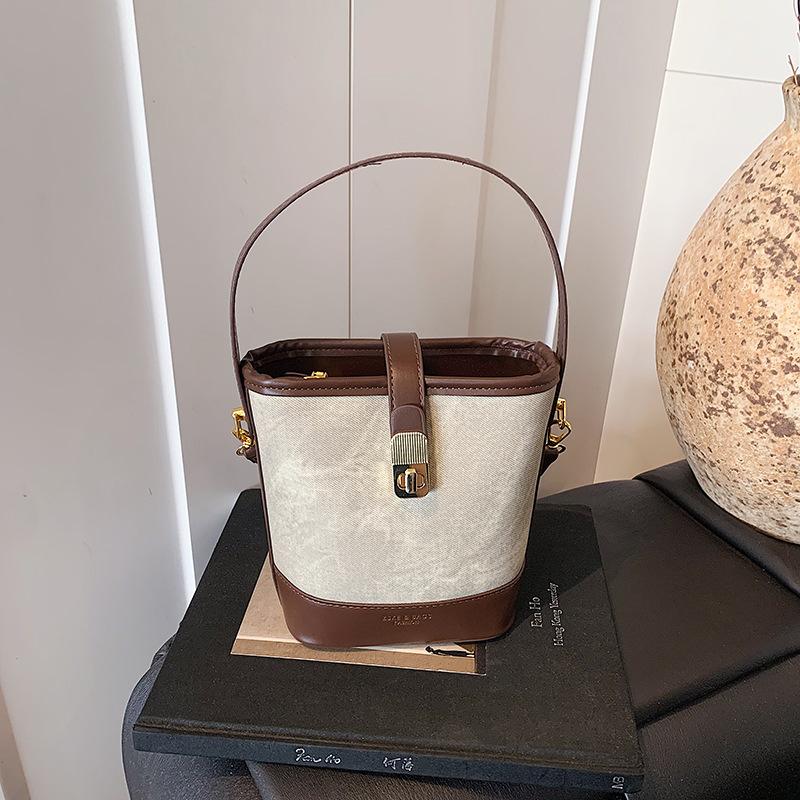 Retro casual texture contrasting color bucket bag 2025 autumn and winter new fashionable versatile simple portable shoulder messenger bag