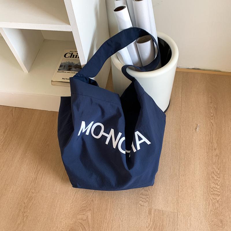Lazy wind casual large-capacity underarm bag women's 2025 new letter-printed canvas bag shoulder bag