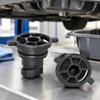 111116RC2B Black Automotive Oil Drain Closure with Two Opposing Grips, Recessed Center Drive, and Round Engineering Plastic Body