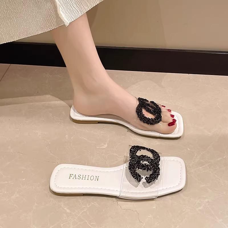 

2025 new slippers women wear flat bottom women summer versatile go out transparent rhinestone one-word drag with diamond sandals women 35
