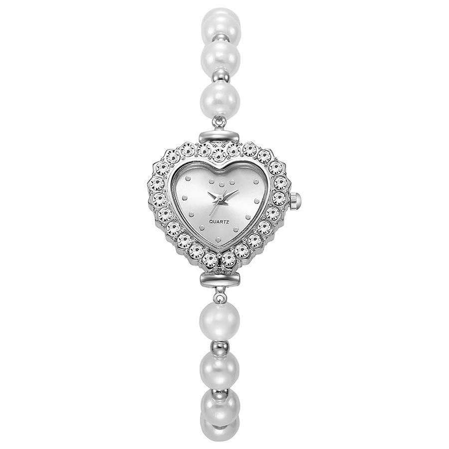 Nouvelle Montre pour Femme en Forme de Cœur à la Mode Montre Fleur pour Dames avec Bracelets Réglables Montres-bracelets