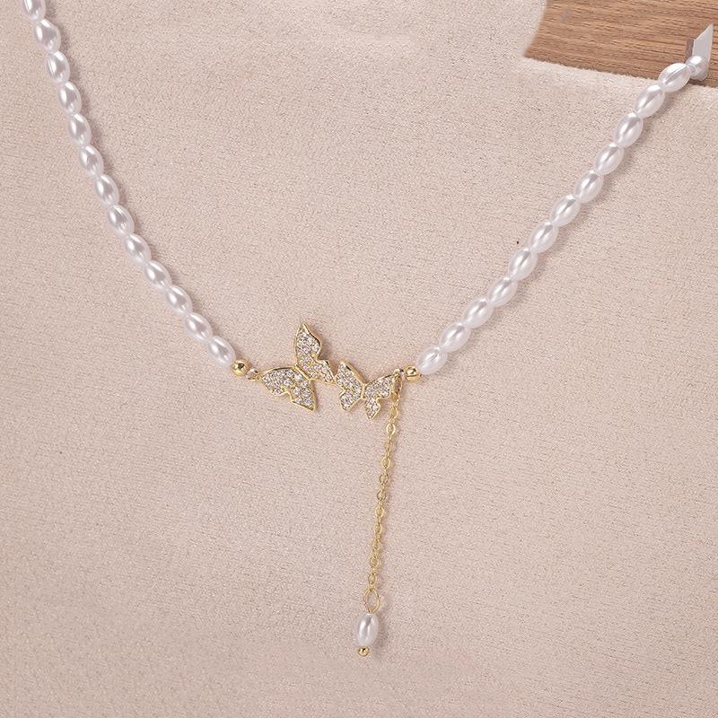 Vintage light luxury butterfly pearl necklace female pendant feeling collarbone neck chain choker