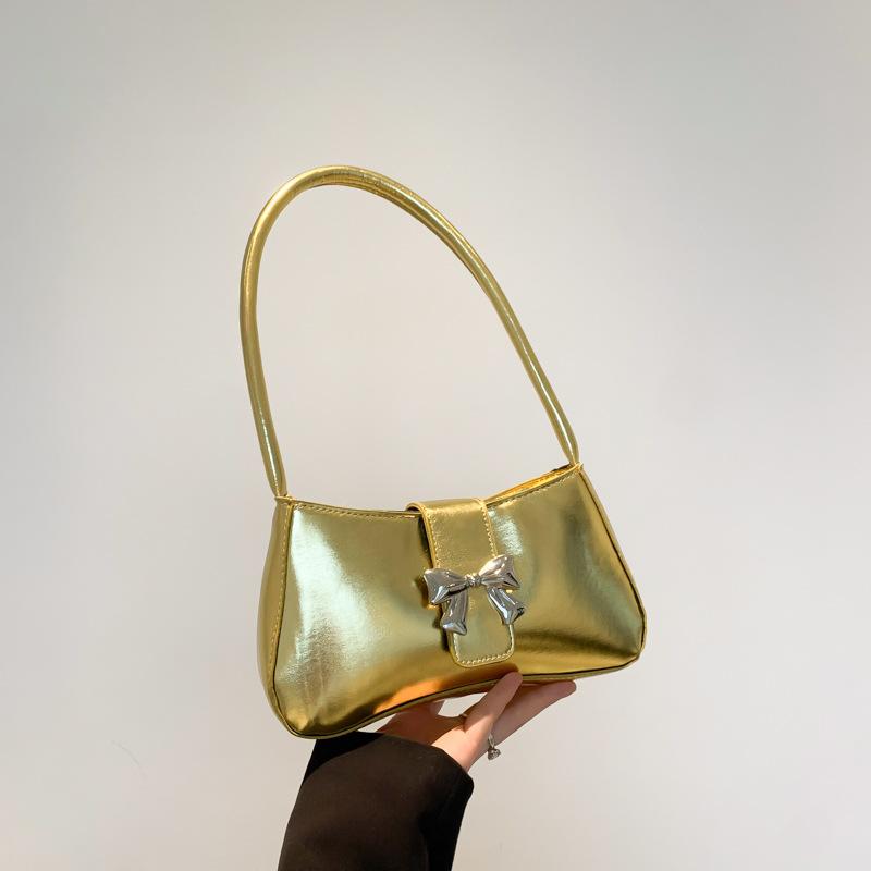 

Повседневная текстура декоративная сумка-бабочка женская 2025 новая трендовая модная простая однотонная в иностранном стиле на одно плечо под мышку багет золотой
