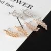 Fashionable Symmetrical Hollow Leaf Earrings New Alloy Long Earrings