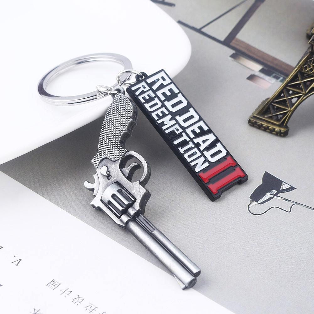 Portachiavi Revolver di Arthur Morgan di RDR2 Red Dead Redemption 2 Ciondolo Portachiavi Regalo per Fan Cosplay Per Uomini Donne Gioielli per Zaino