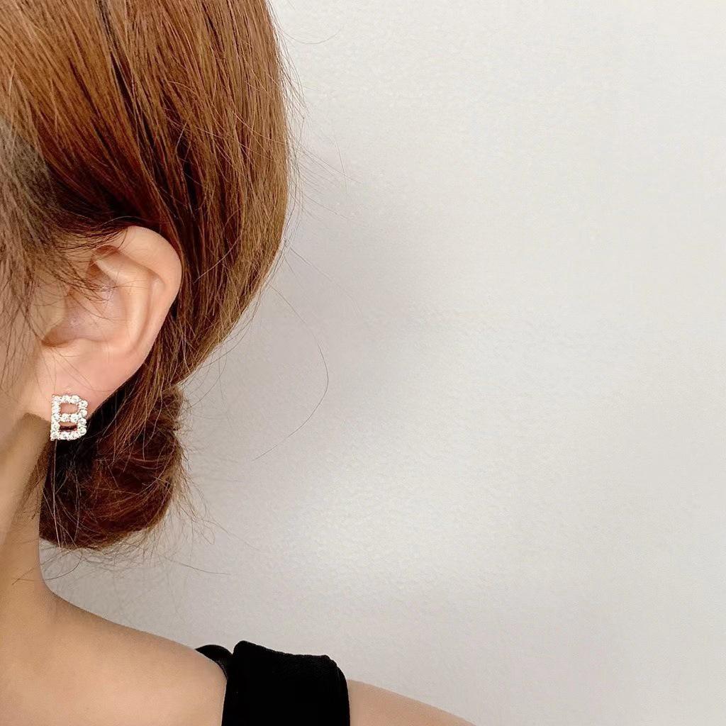 Korean Micro-Diamond Trendy Letter Stud Earrings: Elegant, High-End Accessories for Women's Unique Style.