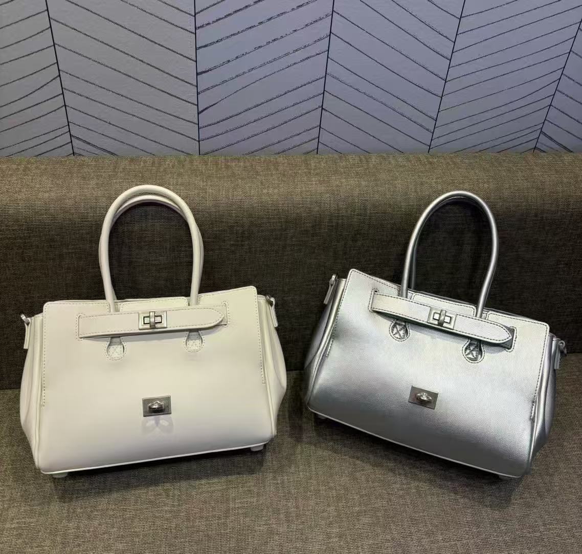 

Сумка из натуральной коровьей кожи большой вместимости для повседневного использования, с застежкой-молнией и однокамерным дизайном 23x12x4.5cm серебряный