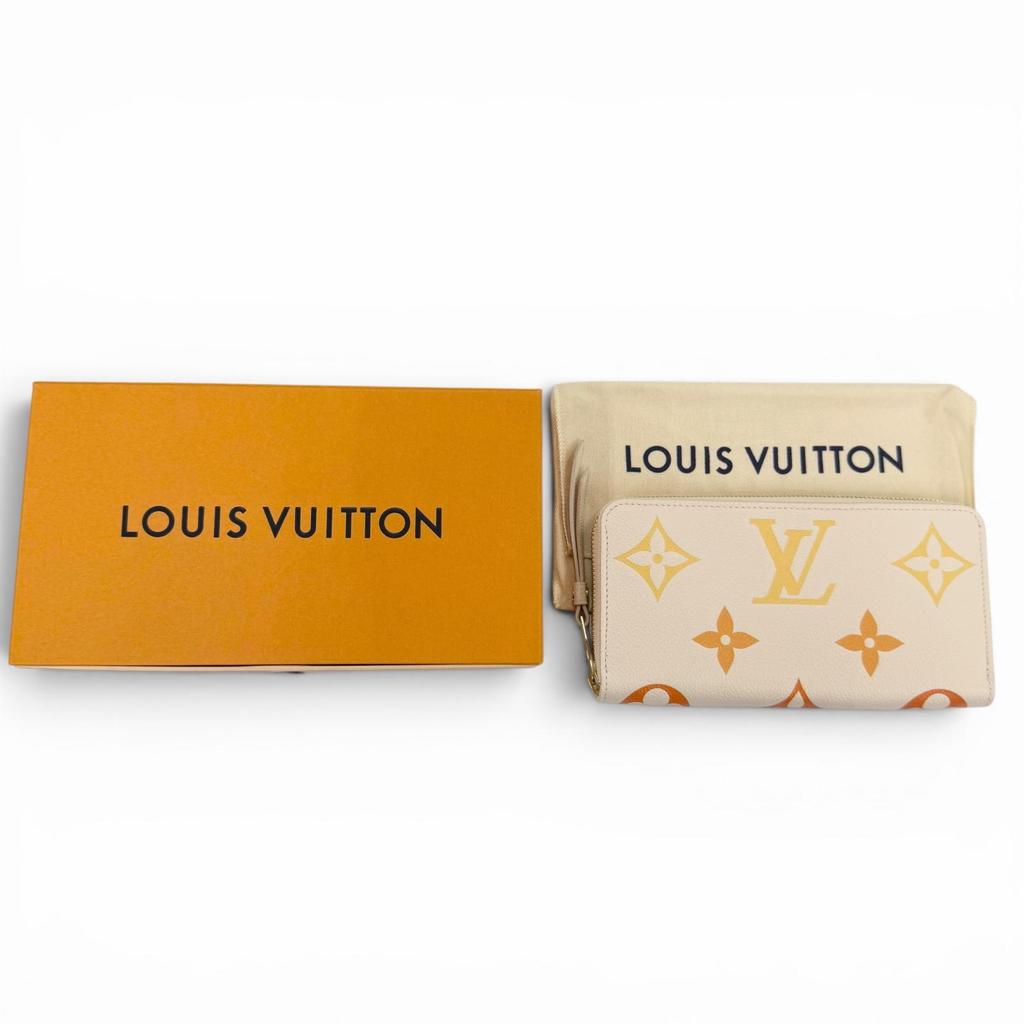 Pristine LOUIS VUITTON LV Gradient Empreinte Zip Around Zippy Wallet M82206 Used