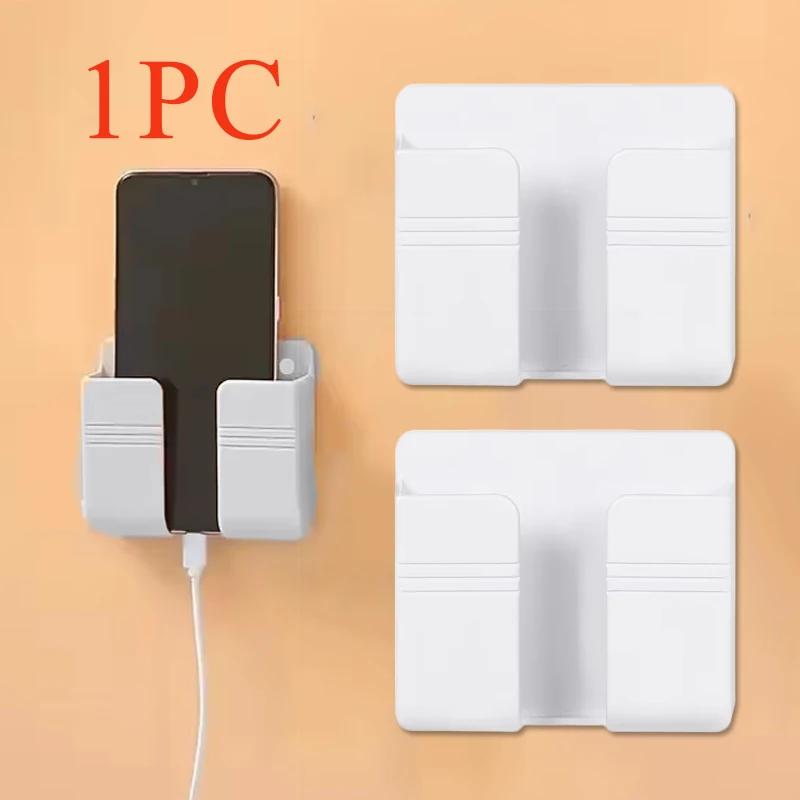 1Pc White Punch Free Wall Mount Phone Plug Holder Mobile Phone Charging Stand Air Conditioner TV Remote Control Storage Box
