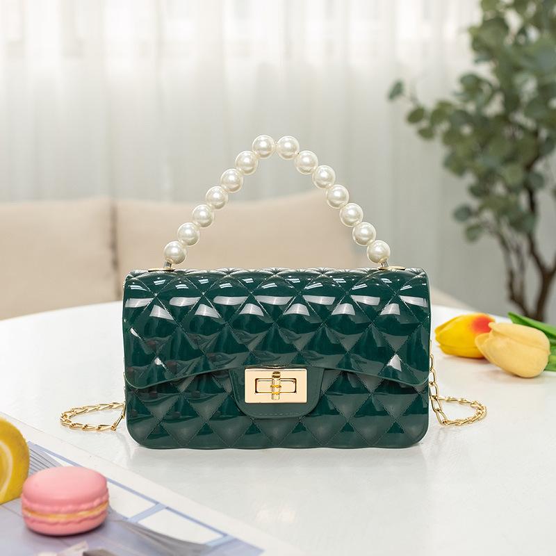 Fashion pearl shoulder jelly bag, women's versatile diamond lipstick change bag, one piece.