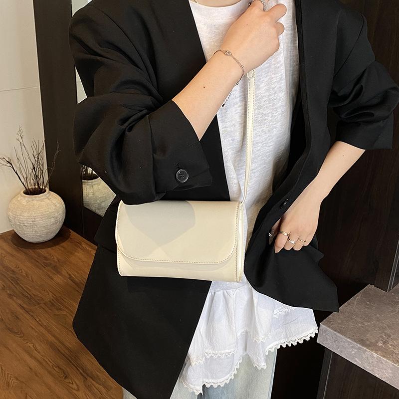 Frühling und Sommer neue strukturierte Tasche Damen Umhängetasche kleine quadratische Tasche Pendeln einfarbig Damen Schulter kleine Tasche