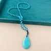 A Long Necklace Resembling Blue Turquoise with a Vintage Teardrop Pendant, Elegant And Stylish in a Bohemian Style, Perfect for Sweaters
