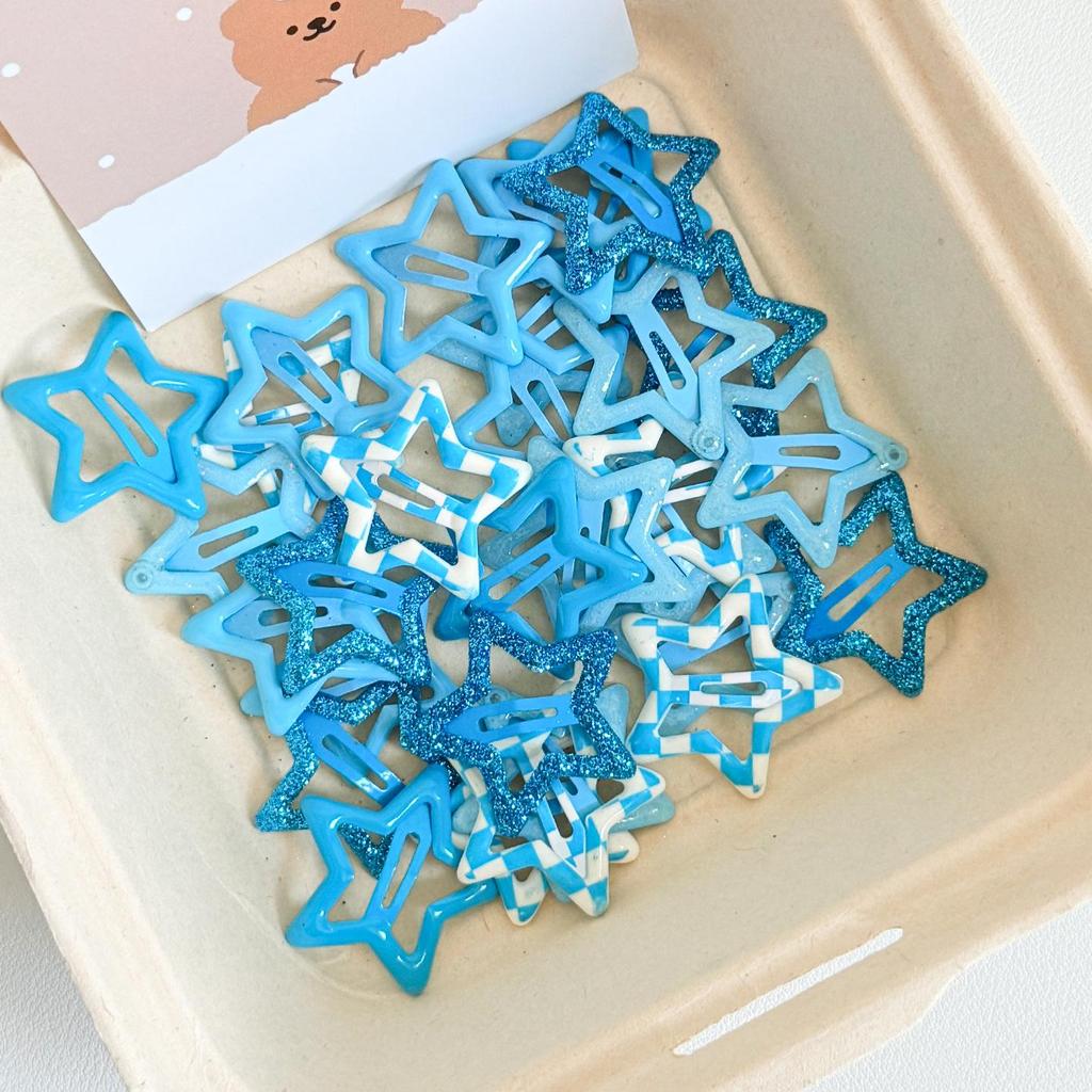 Y2K Star Hair Clips: Cute Five-Pointed Star Accessories for Kids' Side Bangs.