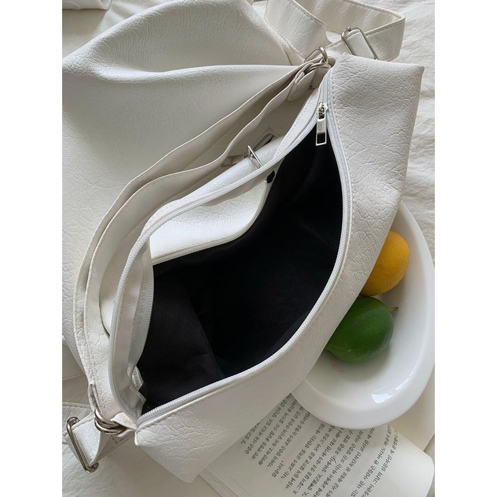 Koreanische Version Schlichte Persönlichkeit Vielseitig Modisch Reißverschlusstasche PU-Leder Tragetasche Schultertasche Pendeln Große Kapazität Rucksack