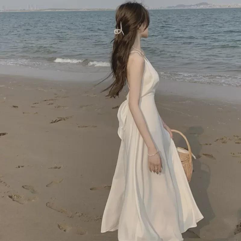 Stylish Backless V-Neck Summer Dress with Lined Skirt In Trendy White.