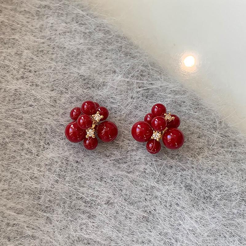 Gold-Plated Silver Needle Resin Zirconia Fireworks Earrings - Elegant High-End Studs for Versatile Style.