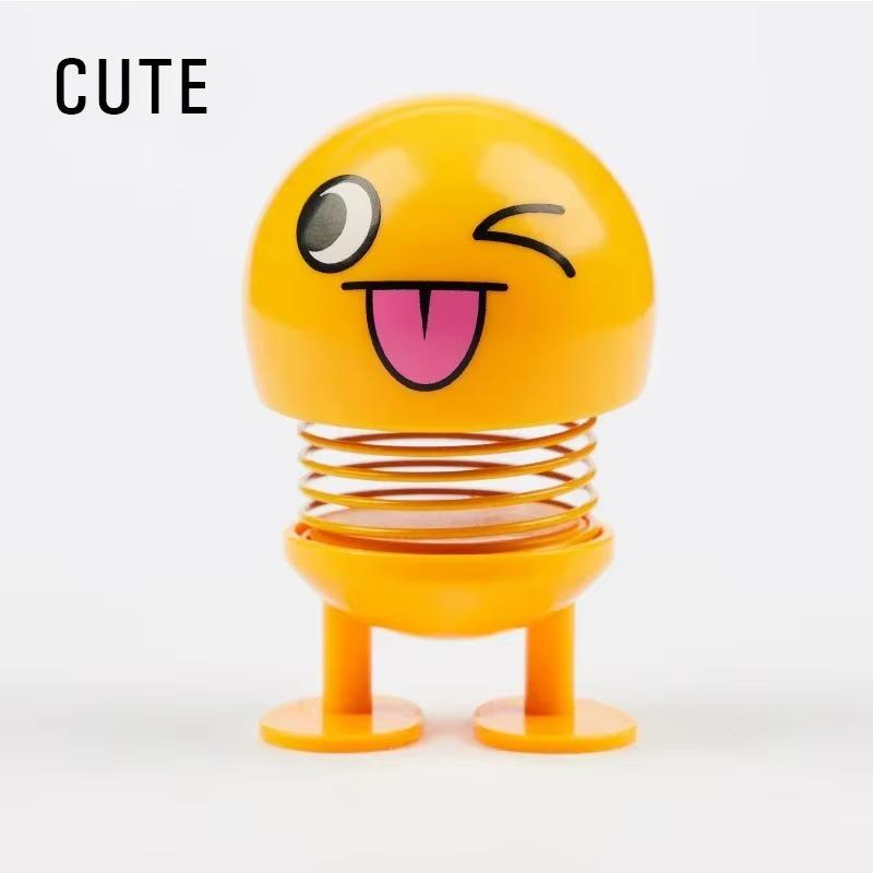 Car interior decoration decoration funny doll shaking head emoticons beautiful Internet red little idea