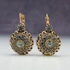 Vintage Gold Color Inlaid with Green Stones Women's Earrings Trendy Metal Carving Round Pattern Dangle Earrings Woman Jewelry