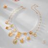 Holiday Style Butterfly Sunflower Alloy Necklace Sexy Spice Girls Pearl Beaded Collarbone Chain Fashion Retro Light Luxury Women's Necklace