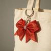Shining Leather Bowknot Keychain Pendant Featuring Secure Hook For Organized Key Carrying And Stylish Enhancement
