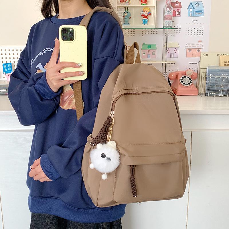 Schoolbag Korean version student schoolbag simple and fashionable large-capacity backpack high value small fresh campus backpack wholesale