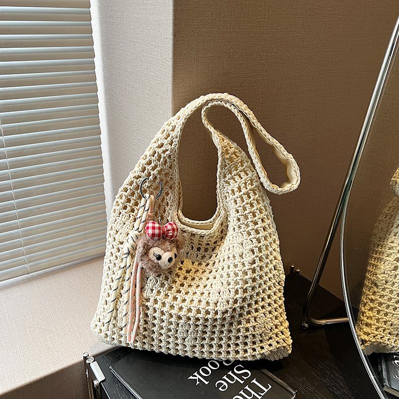 Knitted bag women's large capacity  new spring and summer hollow shoulder shopping bag lazy wind beach tote bag