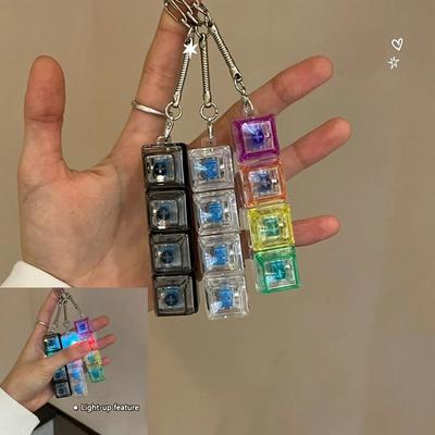 Llavero de Teclado LED Brillante Juguetes para Aliviar el Estrés en la Punta del Dedo Botones No Comprimibles Llavero Colgante para Mochila Escolar de Estudiante Regalos