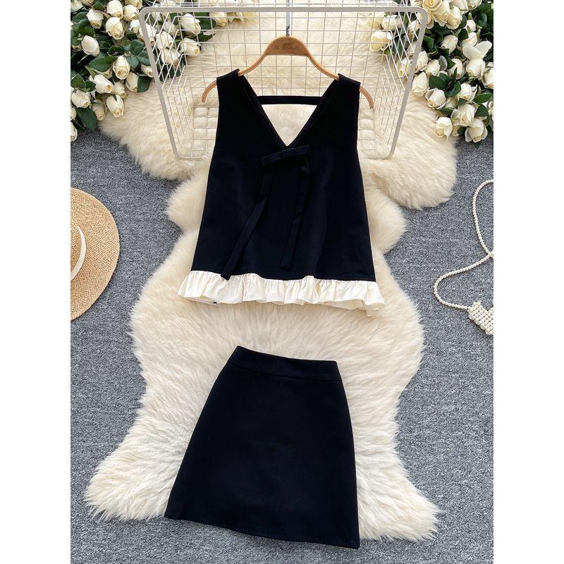 Online Celebrity Ins Niche Popular High-Grade Sense Summer Clothing Two-piece Set Sleeveless Loose Bow Vest High Waist Skirt