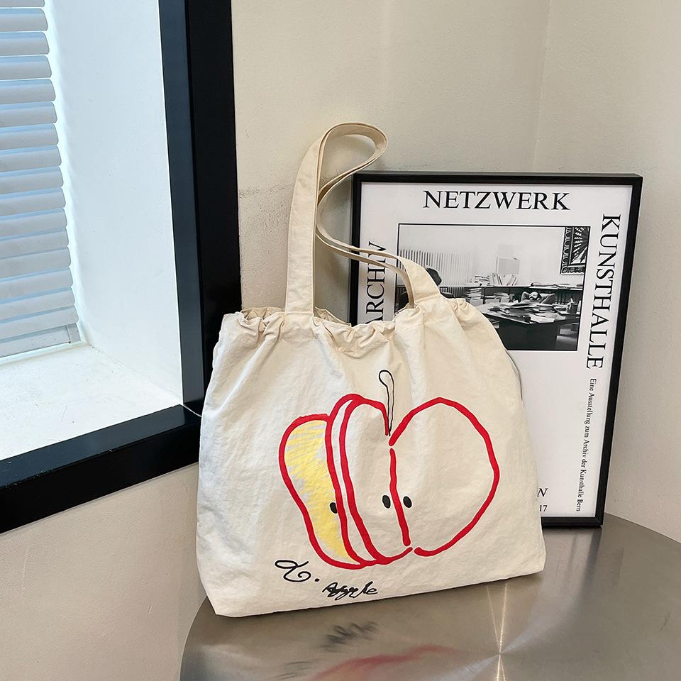 Apple's New Drawstring Canvas Bag Student Light Commuting Versatile Shoulder Bag Niche Large Capacity Simple Tote Bag