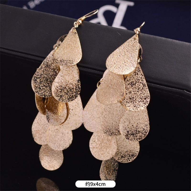 Fashion exaggerated niche temperament fringed earrings retro personality versatile sequined earrings women's long ear jewelry