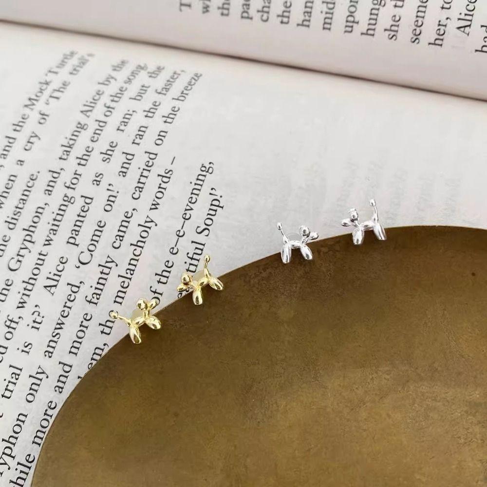 

Серьги-гвоздики в виде мини-собачек из серебра S925, простые золотой