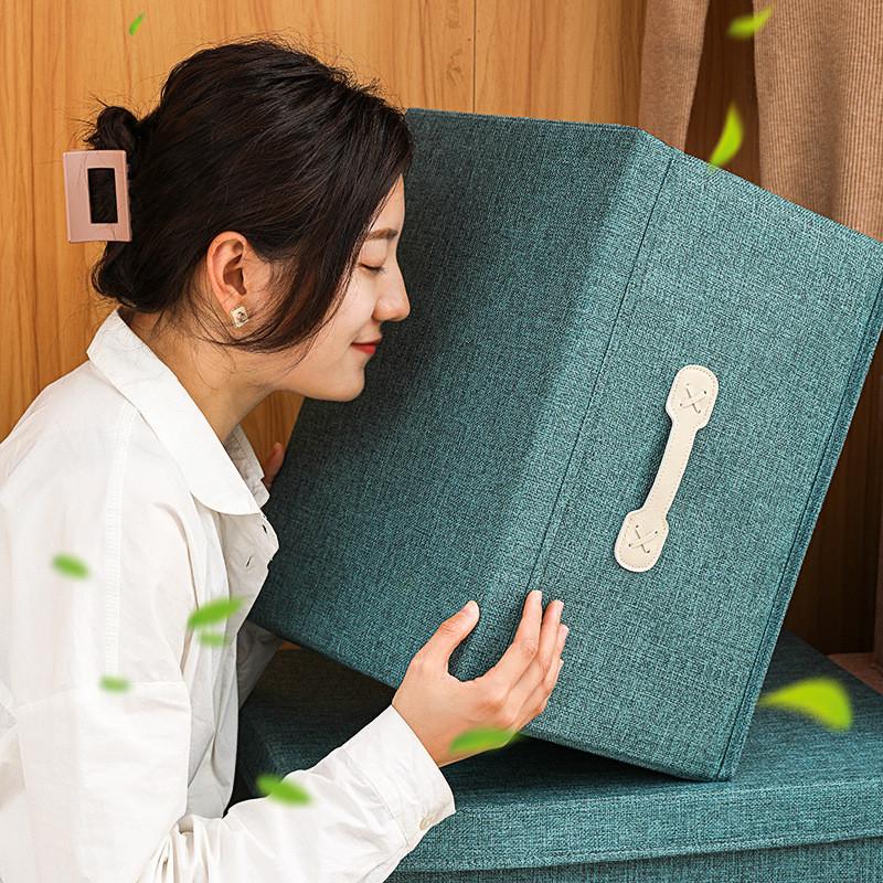 Förvaringslåda för sängkläder i Oxford-tyg med handtag för användning i garderoben