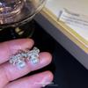 Zircon Bow Temperament Pearl No Earrings Earrings Women's Niche Design Earclips Mosquito Coil Disc High-end Earrings