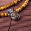 Elegant Double-Sided Green Tara & Yellow Jambhala Bodhi Bracelet with Wenge Clip Accessory