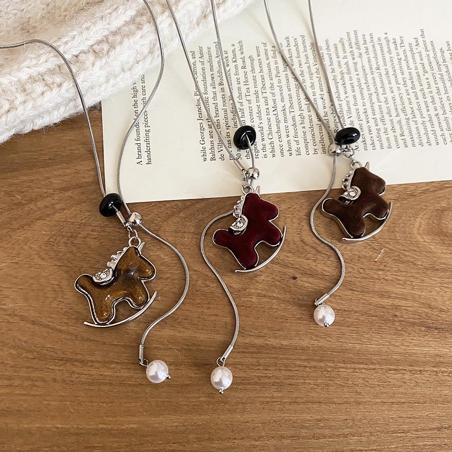 European & American Zircon Resin Rocking Horse Pendant Sweater Necklace - Versatile High-End Autumn/Winter Fashion