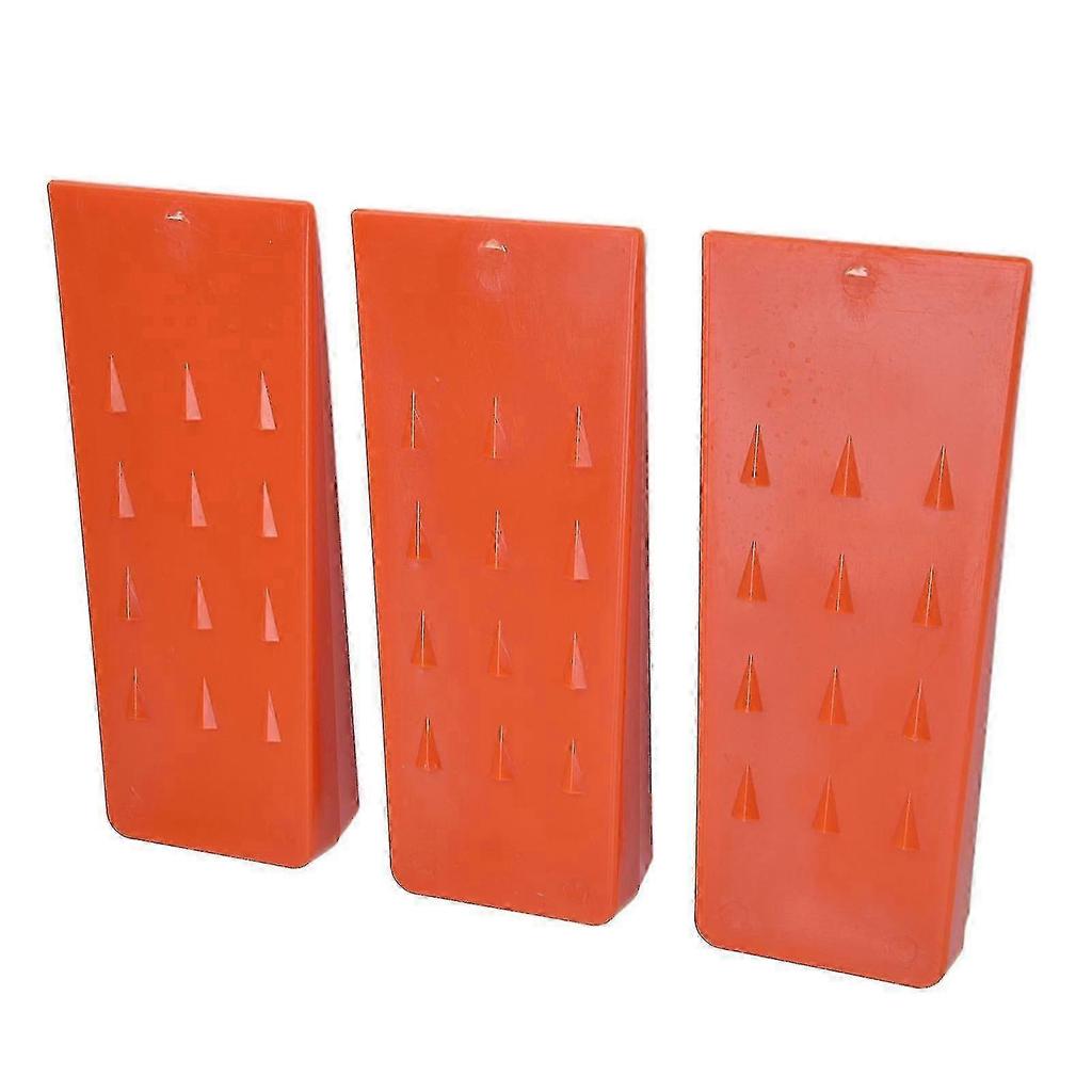 Three 8-inch logging wedges, made of pointed plastic, are safe logging tools suitable for chainsaws and tree cutting.