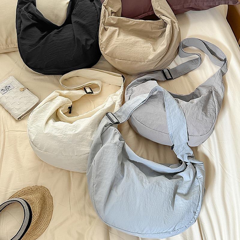 Lazy wind canvas bag new simple dumpling bag versatile women's shoulder bag large capacity commuter messenger bag