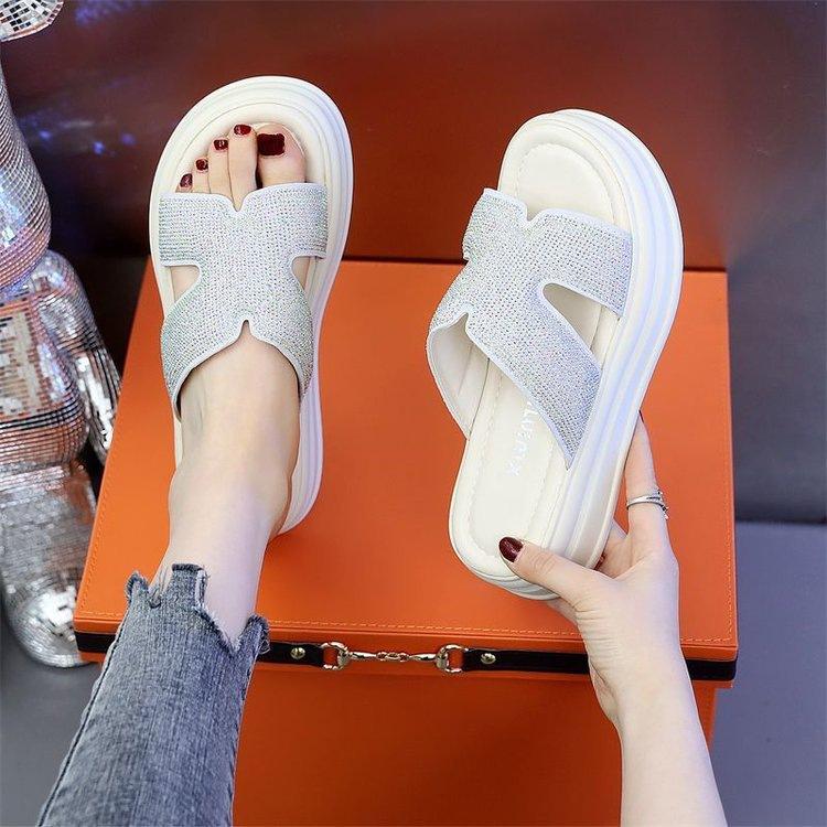Soft leather outer wear one-word women's slippers summer 2025 new women's sandals muffin thick-soled flat-bottomed beach women's sandals