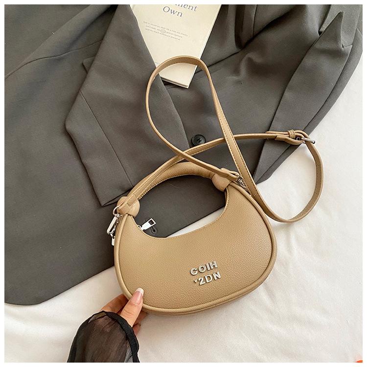 

Корейская версия нишевый дизайн портативная сумка-полумесяц женская 2025 новая трендовая модная сумка под мышкой универсальная на плечо сумка-мессенджер хаки