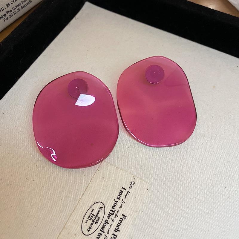 Boucles d'oreilles bohèmes roses à fleurs de perles de rocaille et pompons de perles