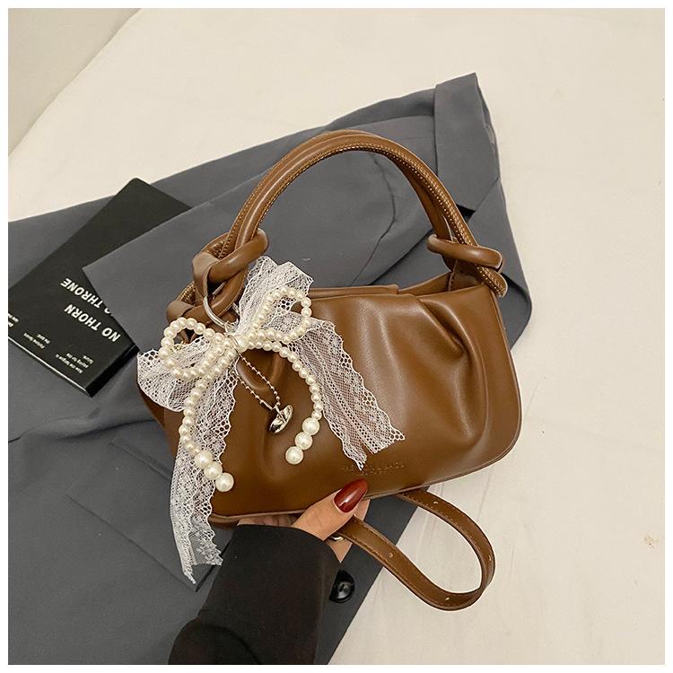 High-end Niche Bag Women's 2025 New Summer Versatile Messenger Bag Fashionable Portable Pleated Bucket Bag