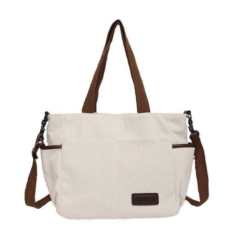 Spacious Canvas Shoulder Bag For Women In Stylish Minimalist Urban Design Ideal For Casual Travel